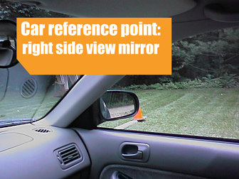 Right side-view mirror as a reference point for a stop line