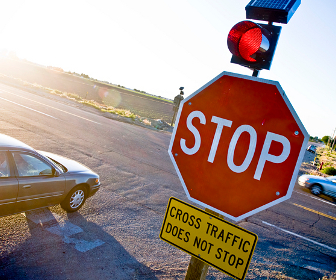 An intersection controlled by a stop sign